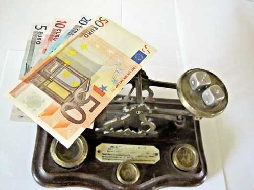 banknotes on scales
